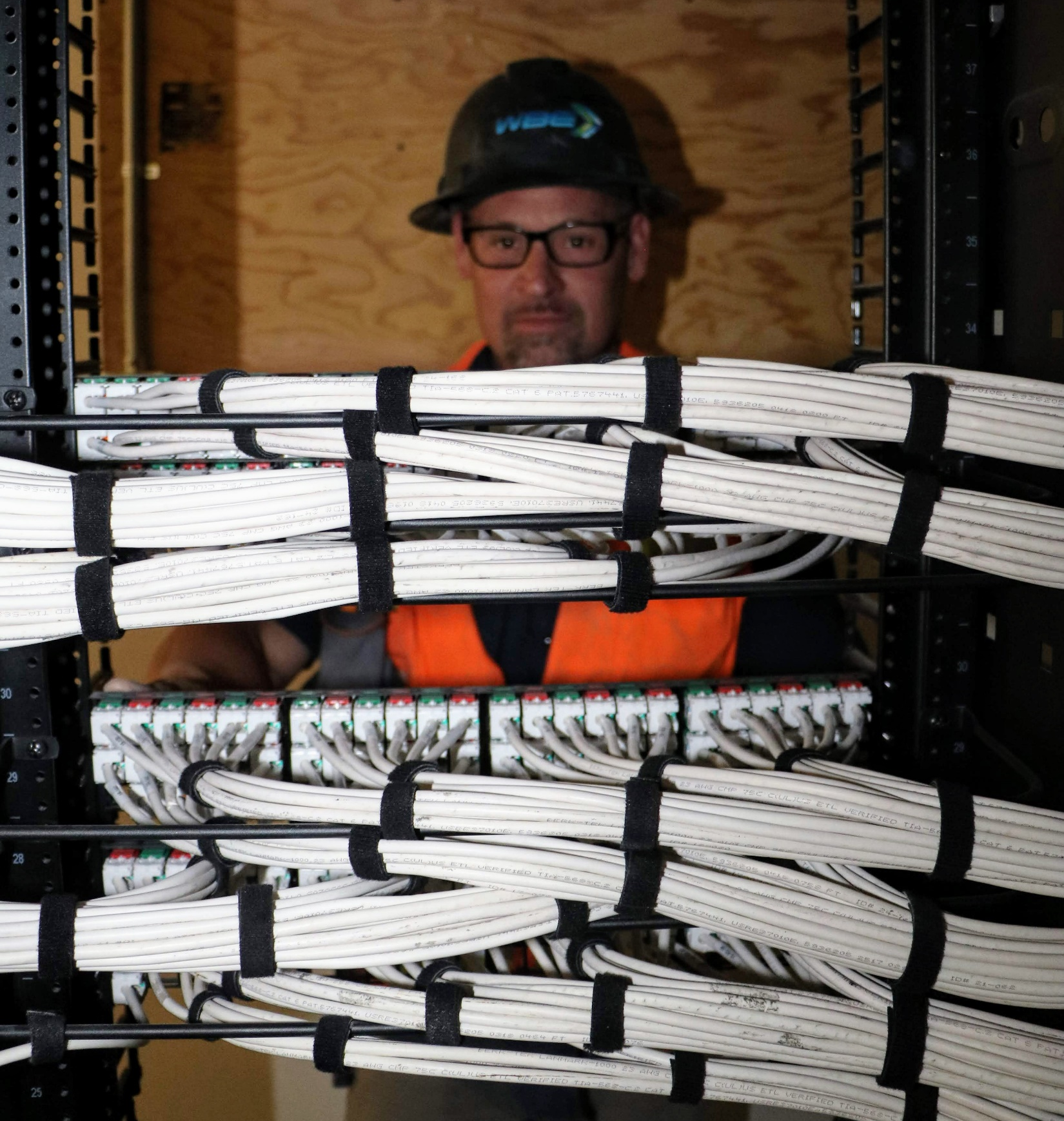 WBE Telecom Foreman installing cable